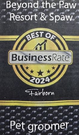 A 2024 "Best of BusinessRate" award seal for Beyond the Paw Resort & Spaw in Fairborn, Ohio, designating them a pet groomer.