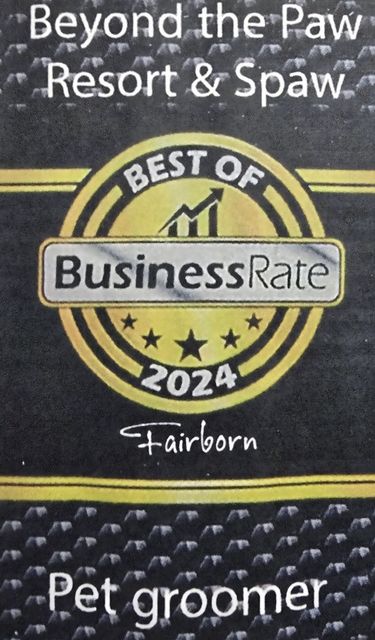 A 2024 "Best of BusinessRate" award seal for Beyond the Paw Resort & Spaw in Fairborn, Ohio, designating them a pet groomer.