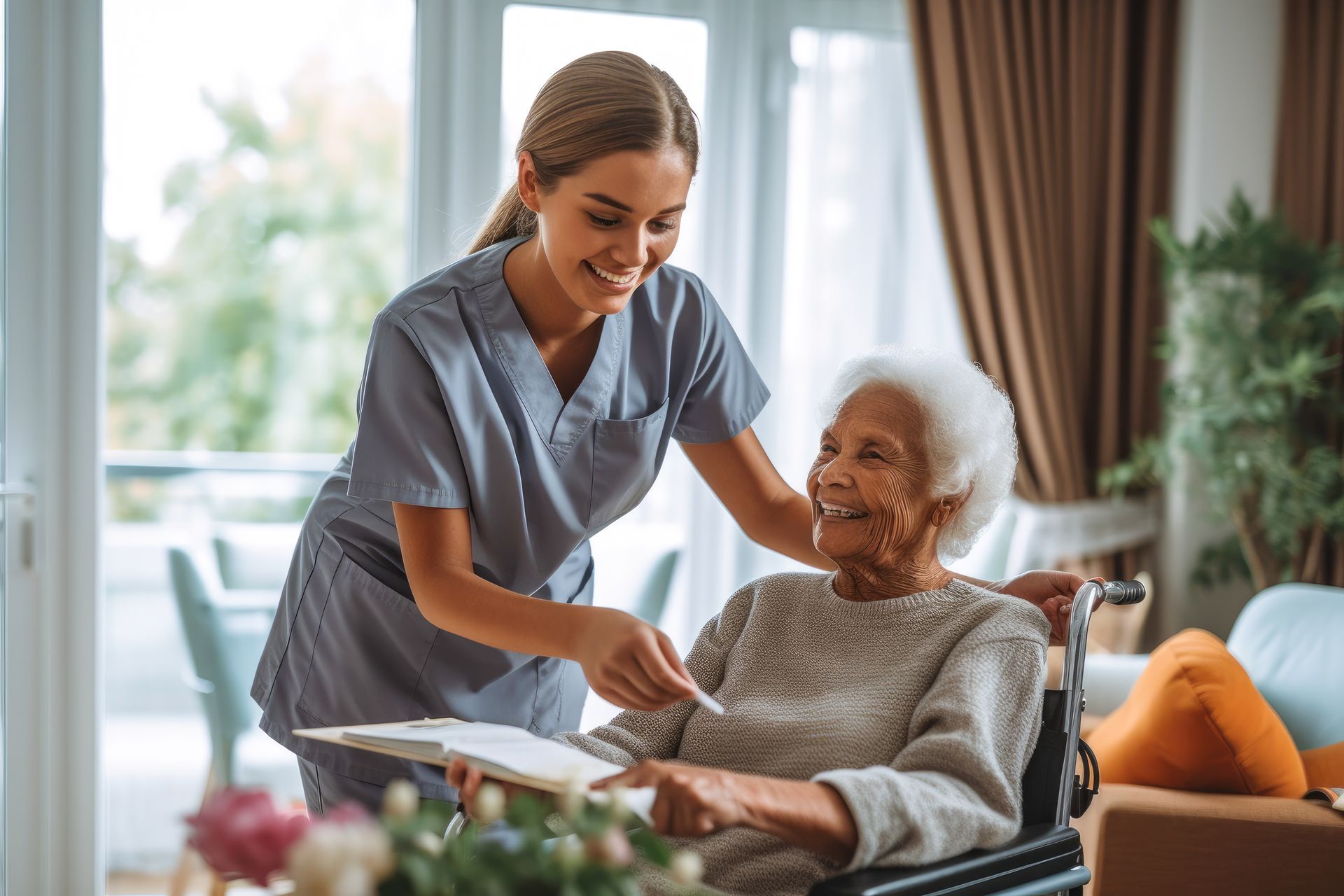 Nurse in scrubs helping senior woman in wheelchair review a clipboard. Bright room.