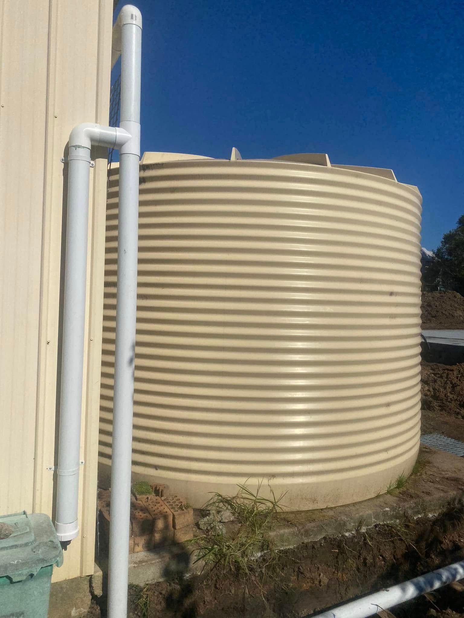 A Beige Corrugated Water Tank — Medowie Plumbing & Gas in in Newcastle