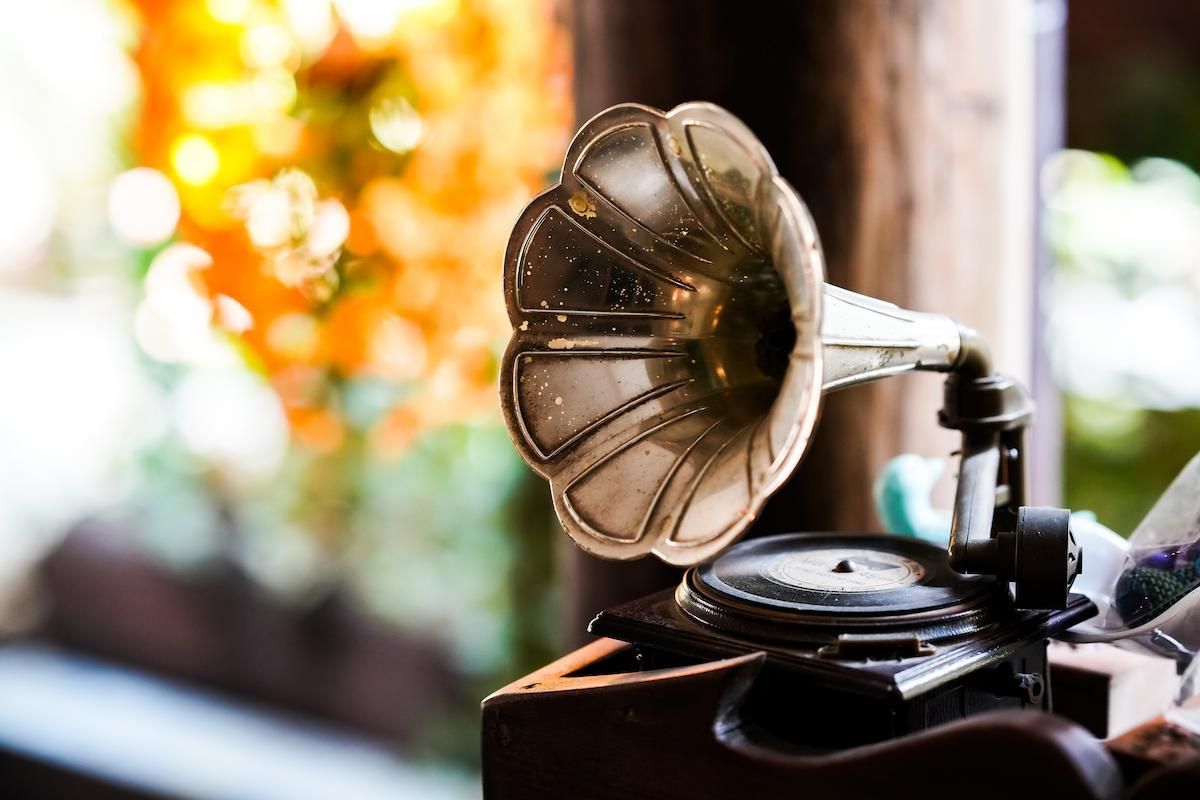 A small phonograph with a blurred background
