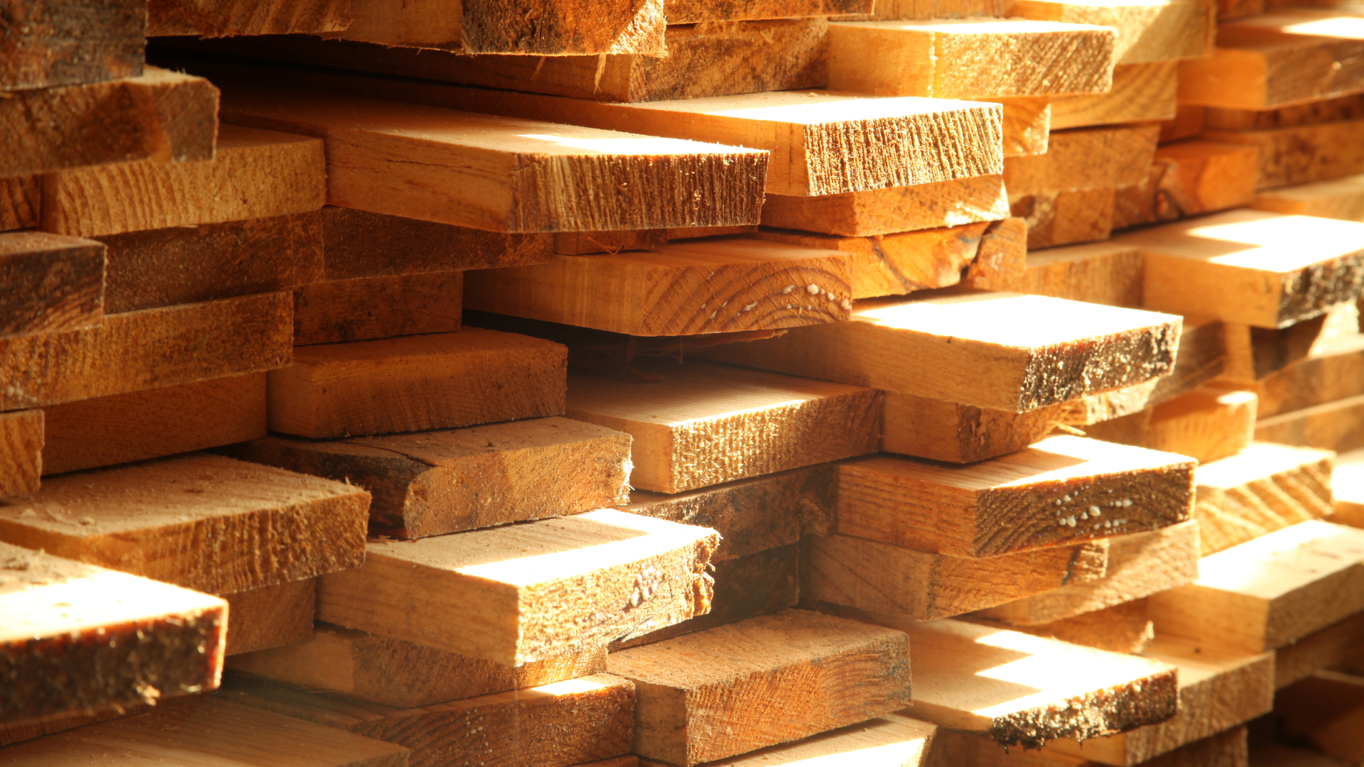A pile of wood is stacked on top of each other.