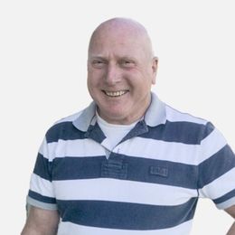 A bald man wearing a blue and white striped shirt is smiling Paul  Poolcorp Pools Auckalnd