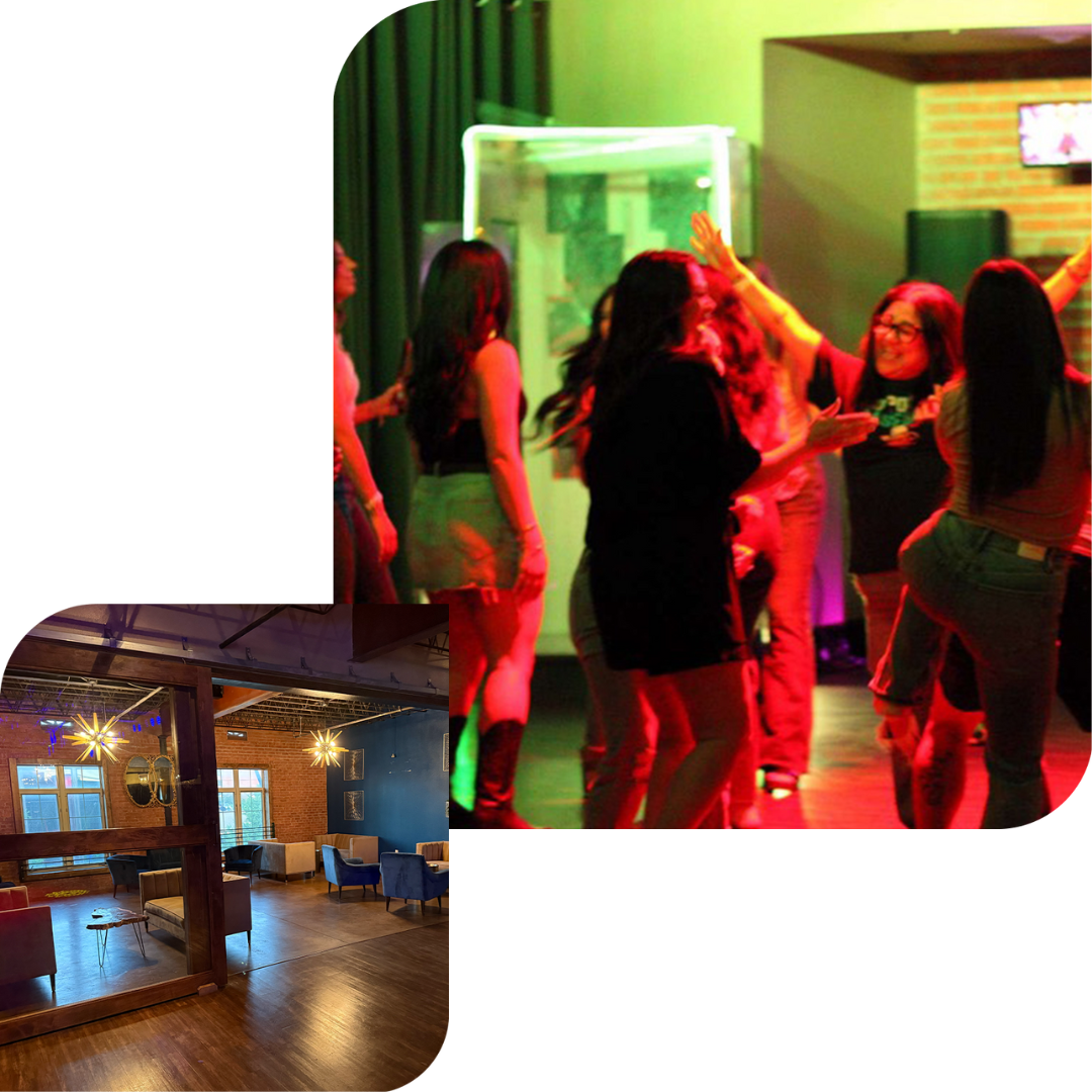 A group of people are dancing in a dark room