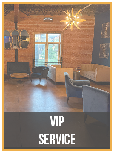 A living room filled with furniture and a sign that says vip service.