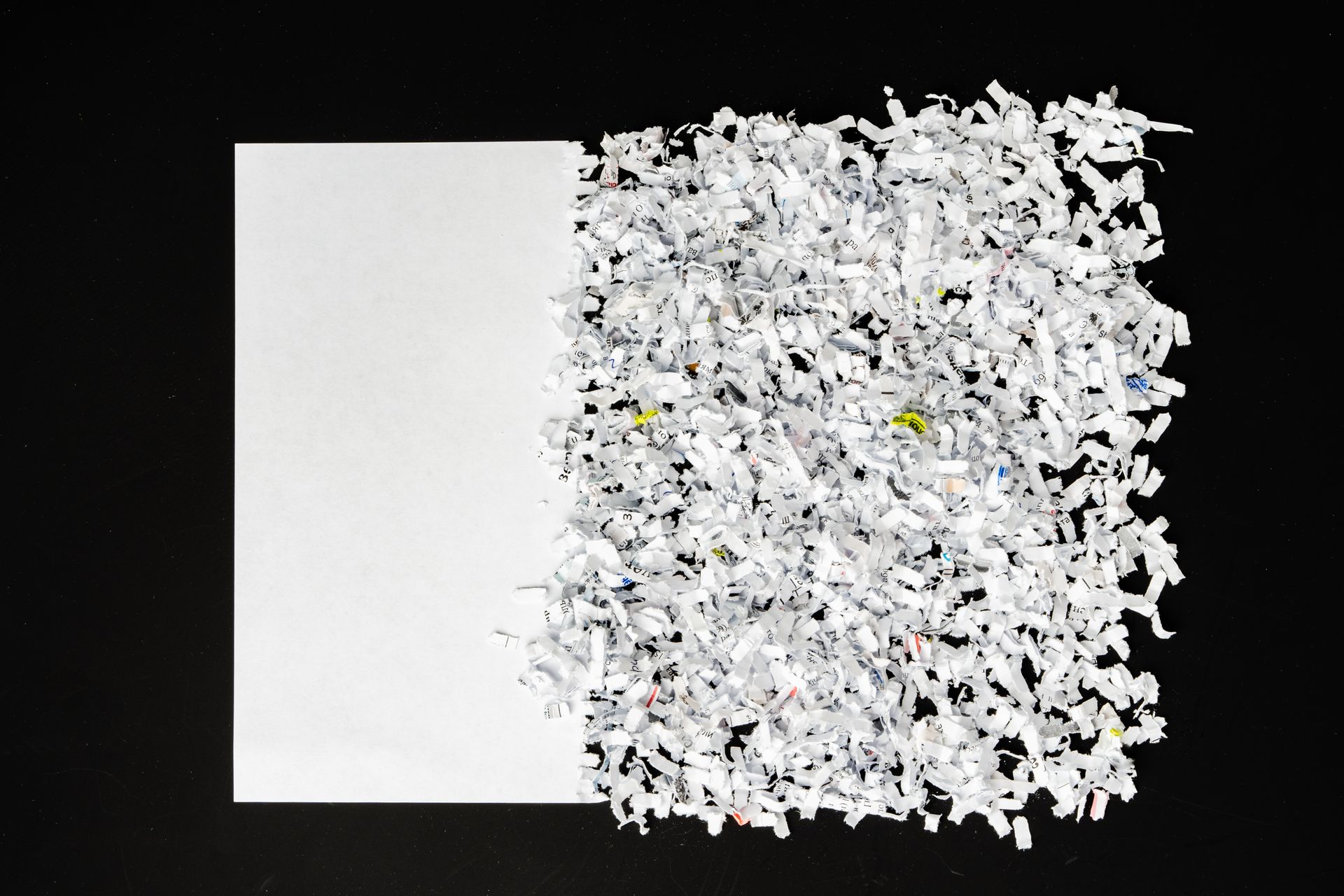 A pile of shredded paper is sitting on a table.