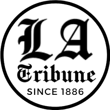 A black and white logo for the la tribune since 1886.