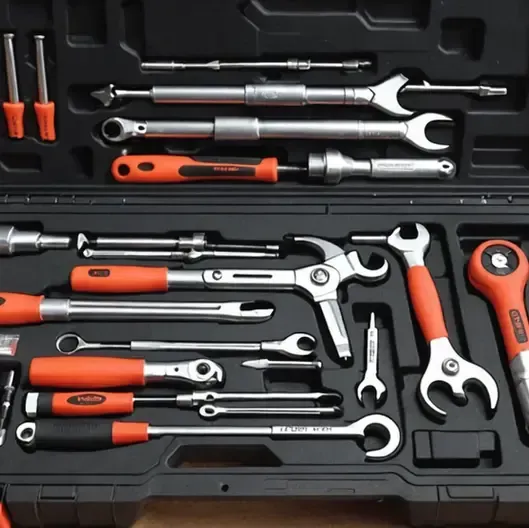 A case filled with a variety of tools including a hammer