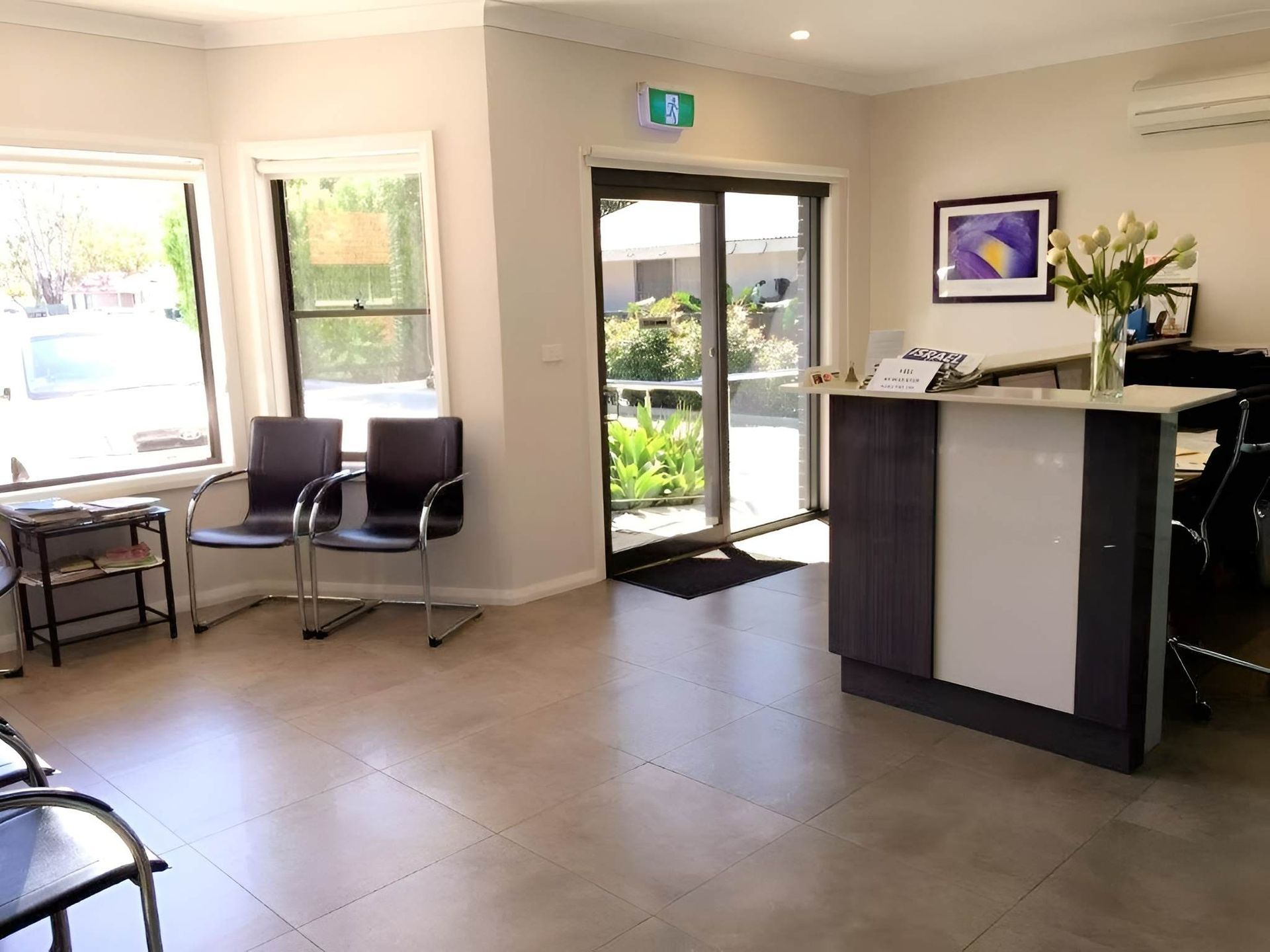 Reception Area With Waiting Chairs and Desk — Mid North Coast Drafting & Construction in Harrington, NSW