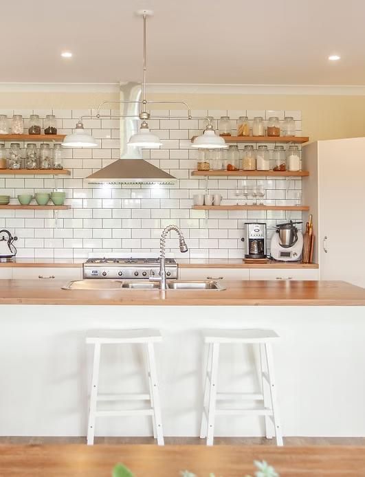 Modern Kitchen With White Subway Tile and Wooden Countertops — Mid North Coast Drafting & Construction in Taree, NSW