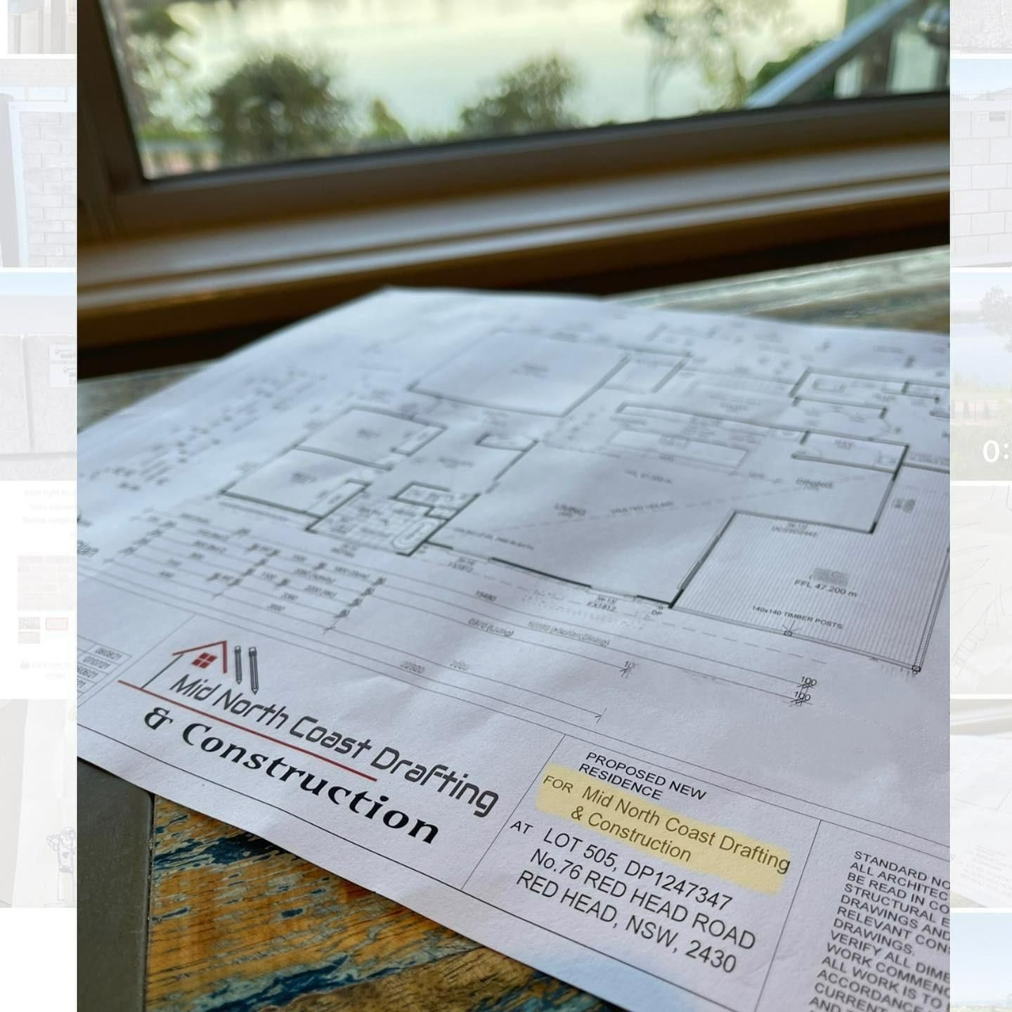 Architectural Blueprints on Table — Mid North Coast Drafting & Construction in Diamond Beach, NSW