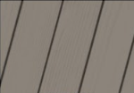 A close up of a wooden surface with a diagonal pattern.