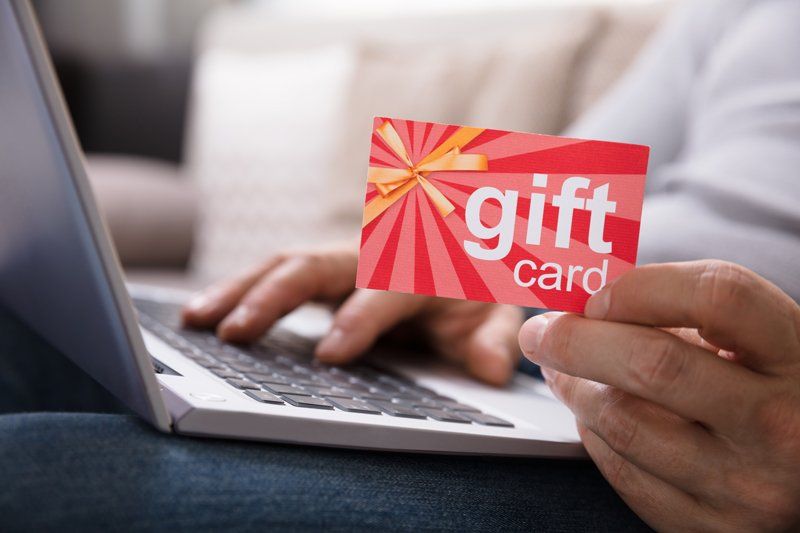 Person holding gift card