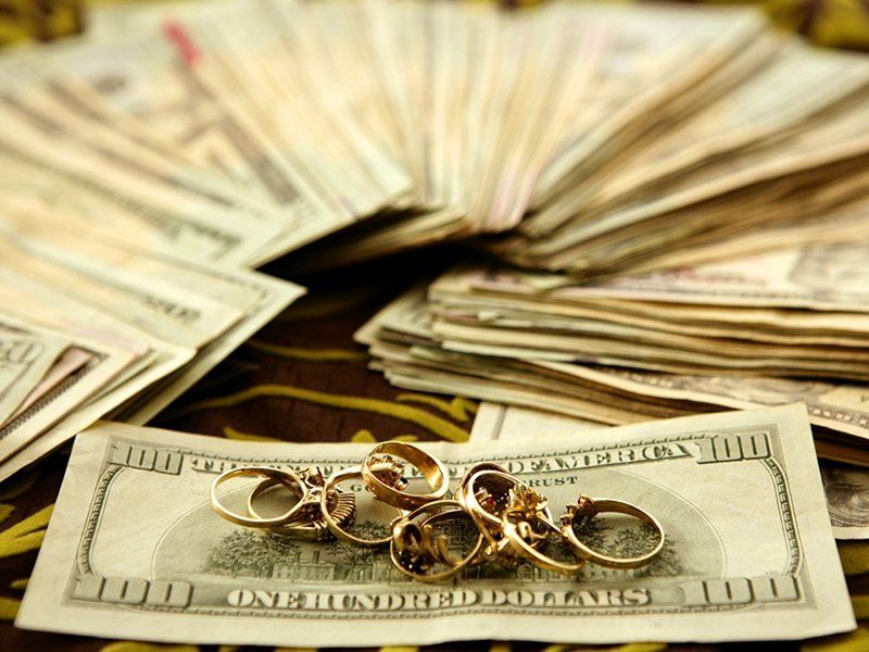 Money and gold rings
