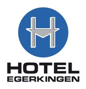 Das Logo des Hotels Egerkingen ist ein blauer Kreis mit einem H darauf.