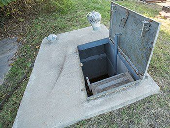 Flat Top Storm Shelter Door Open