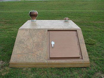 Sloped Front Decorative Storm Shelter Brown