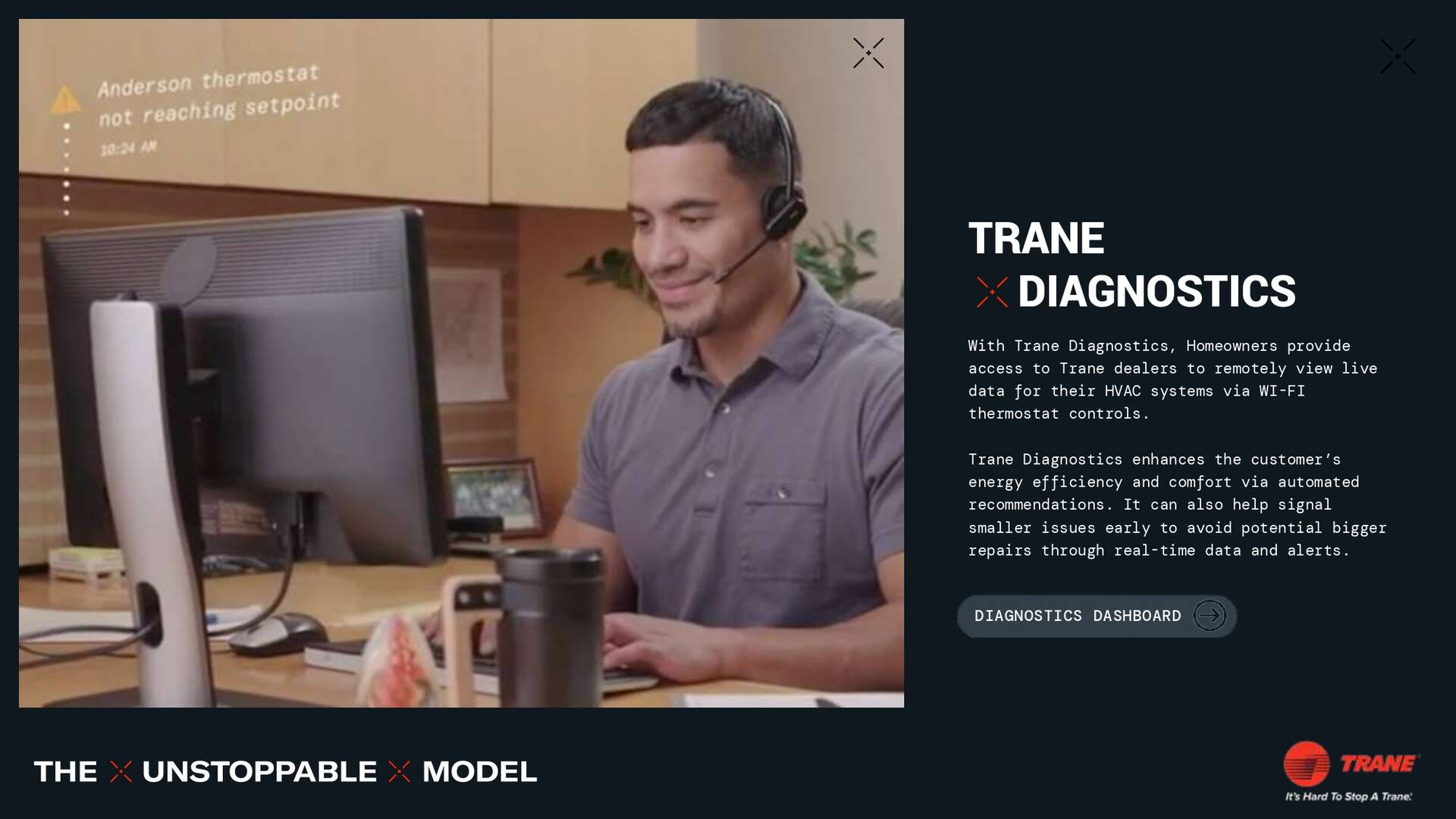 Man wearing a headset smiles at a computer while working in an office; Trane Diagnostics advertisement.