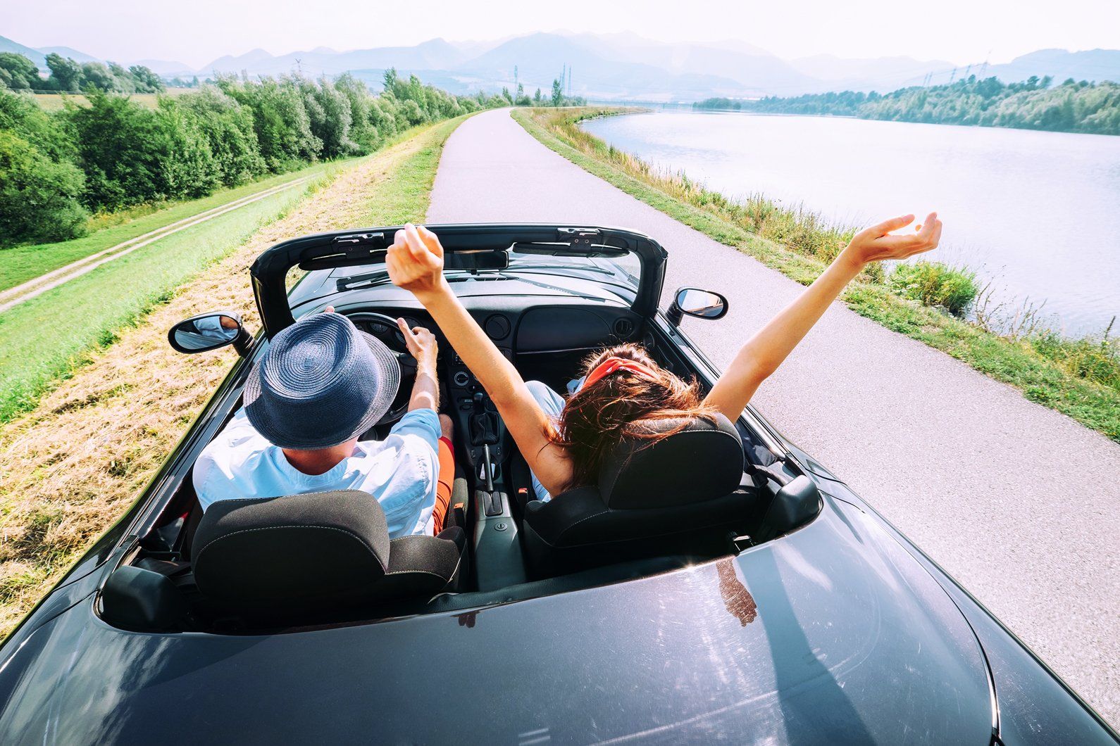 Couple Driving a Car for a Vacation — Denham Springs, LA — Denham Finance, Inc.