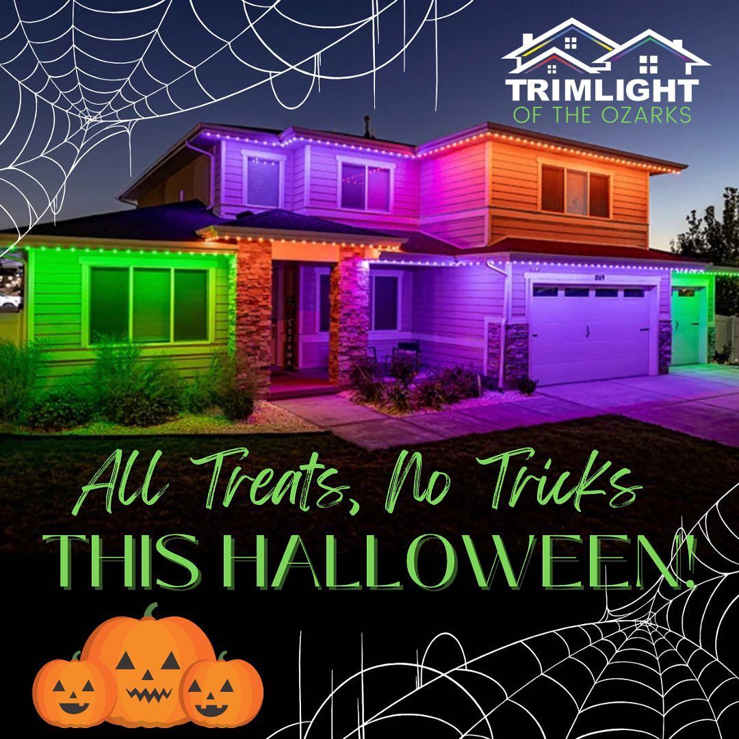 A picture of a house with halloween lights on it