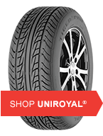 A car tire with a wheel on a white background with a red