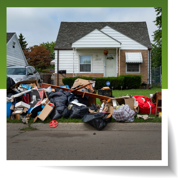 A pile of garbage outside the house