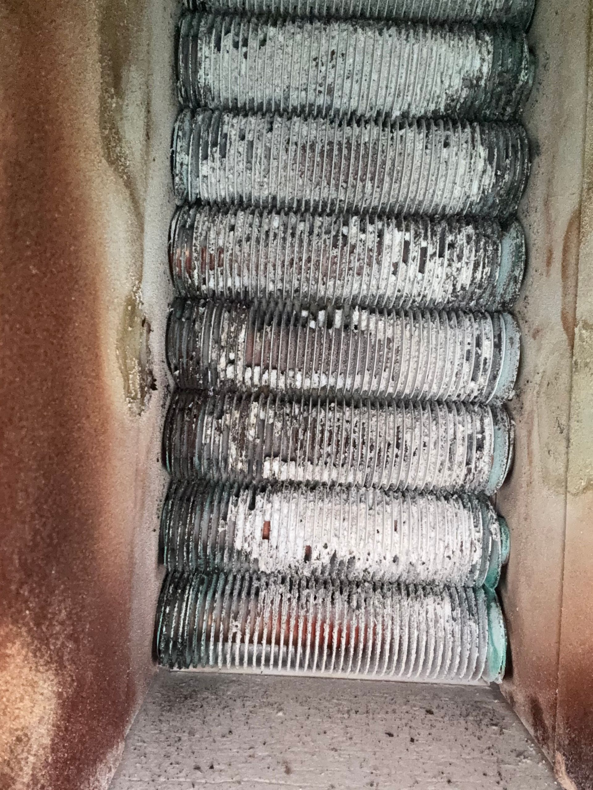 A close up of a stack of tires in a room.