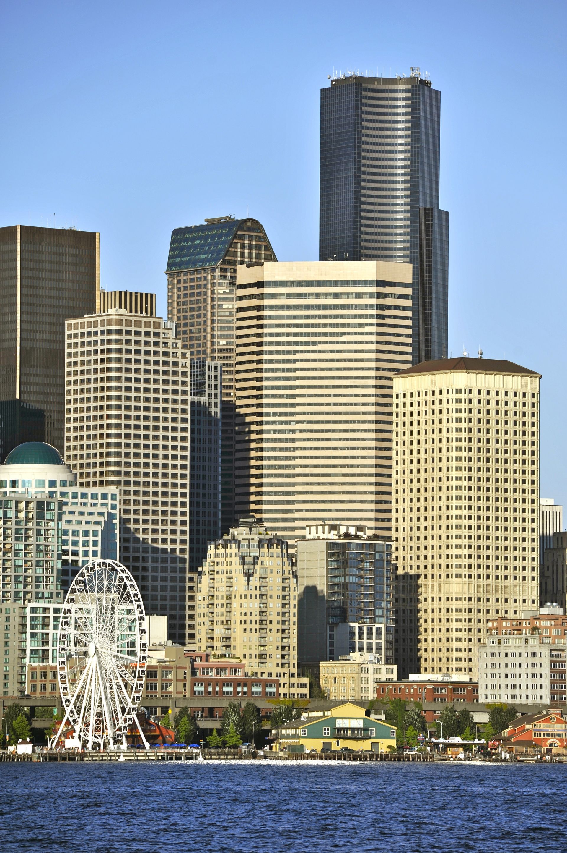 Seattle skyline with a Ferris wheel and waterfront.