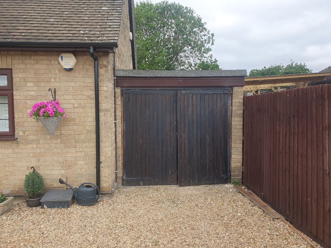 old garage door before new sectional garage door installed