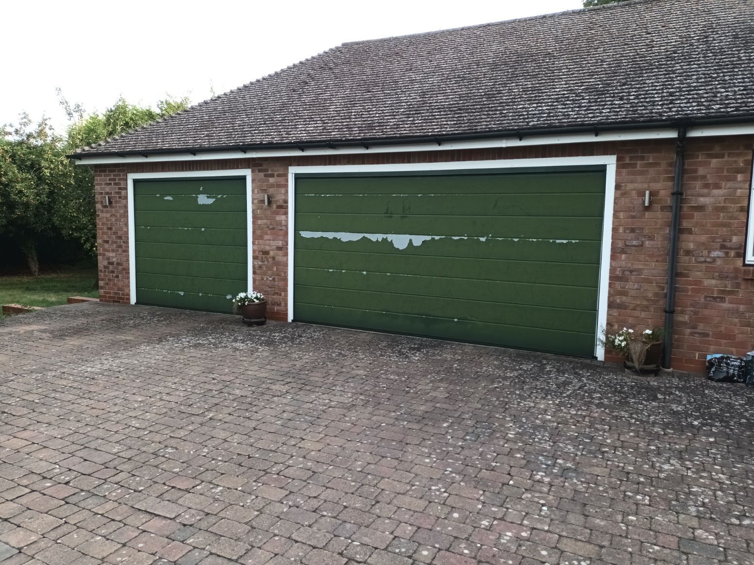 old sectional garage door before replacement