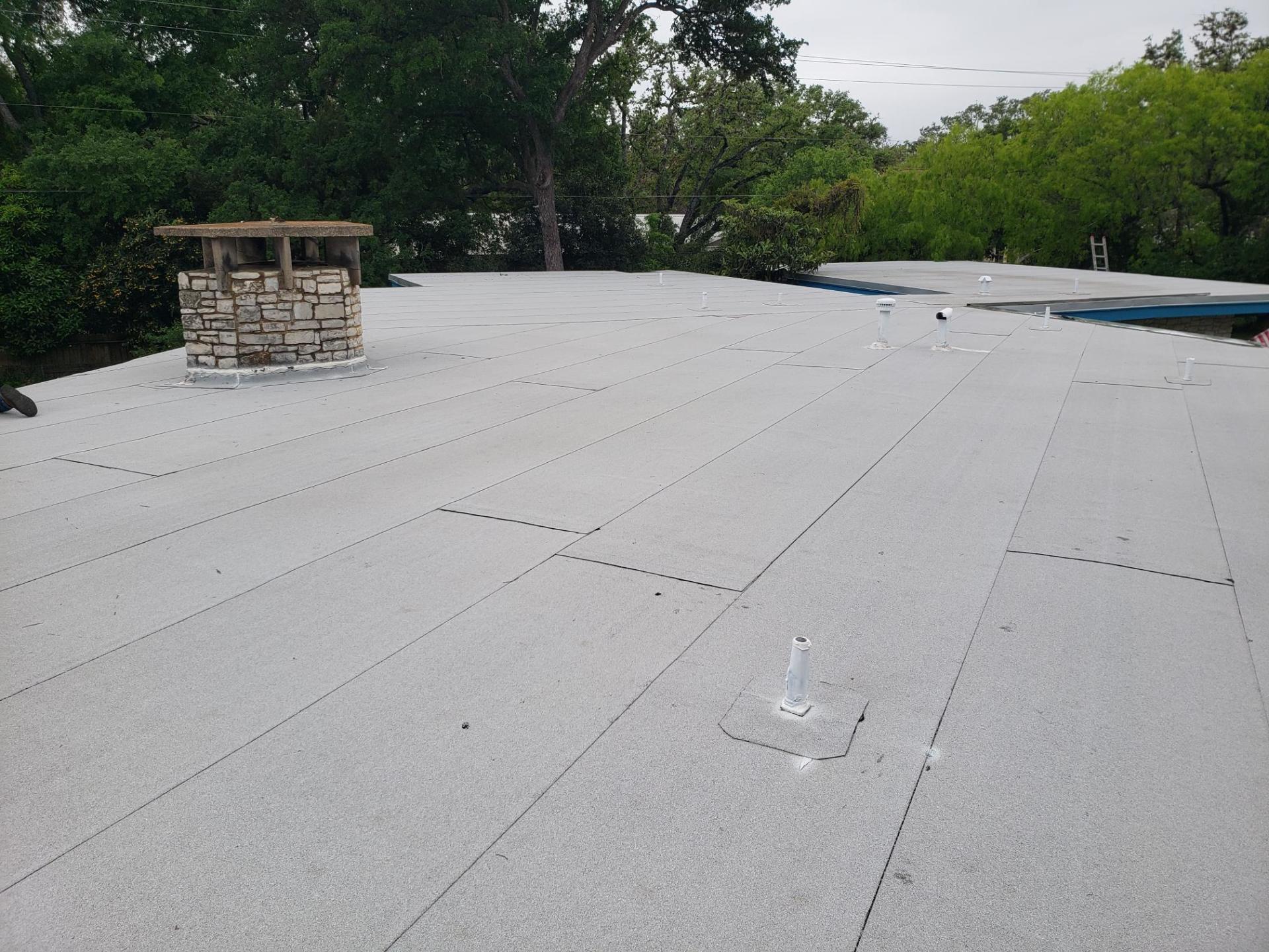Flat Roof Using Bitumen — San Antonio, TX — Alexander’s Roofing