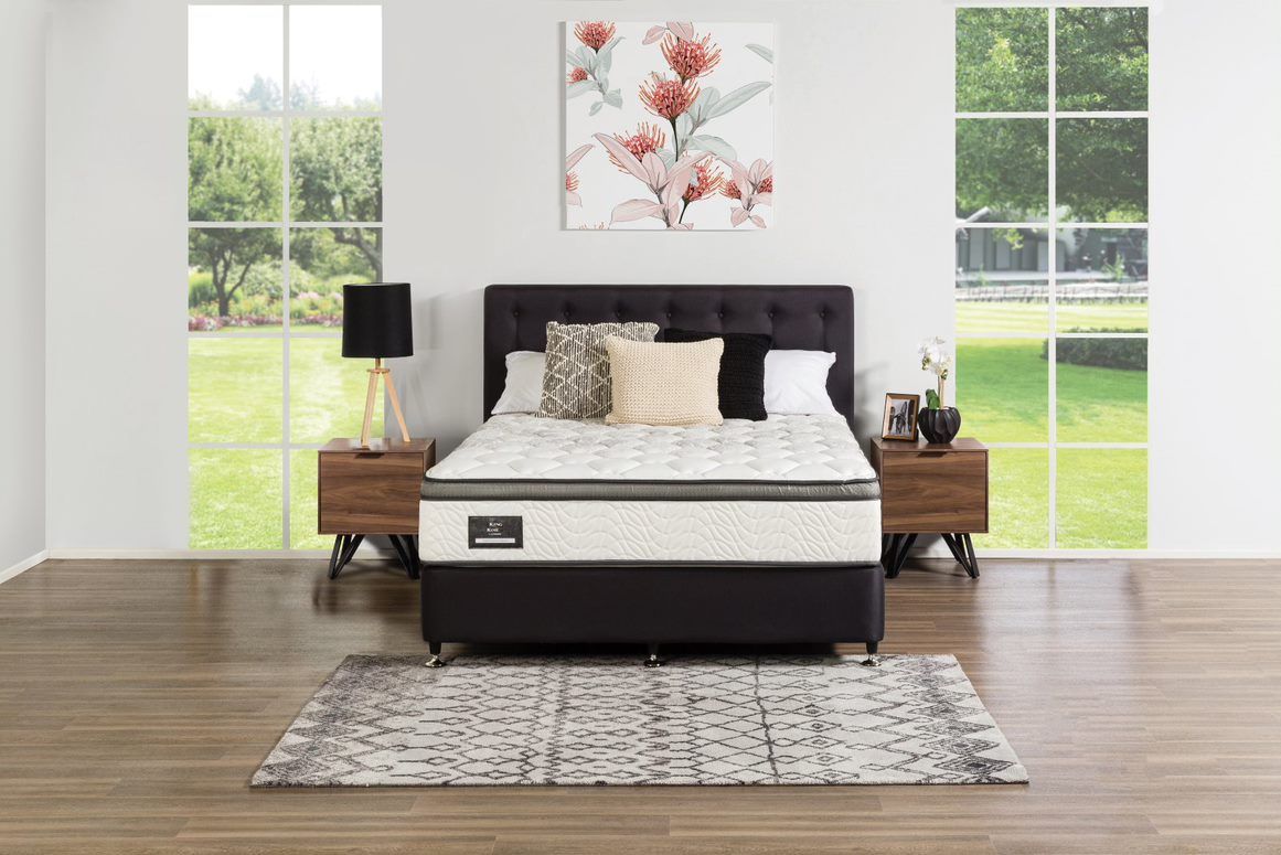 Sunny Bedroom with Black Bed — High-Quality Furniture in Warwick, QLD