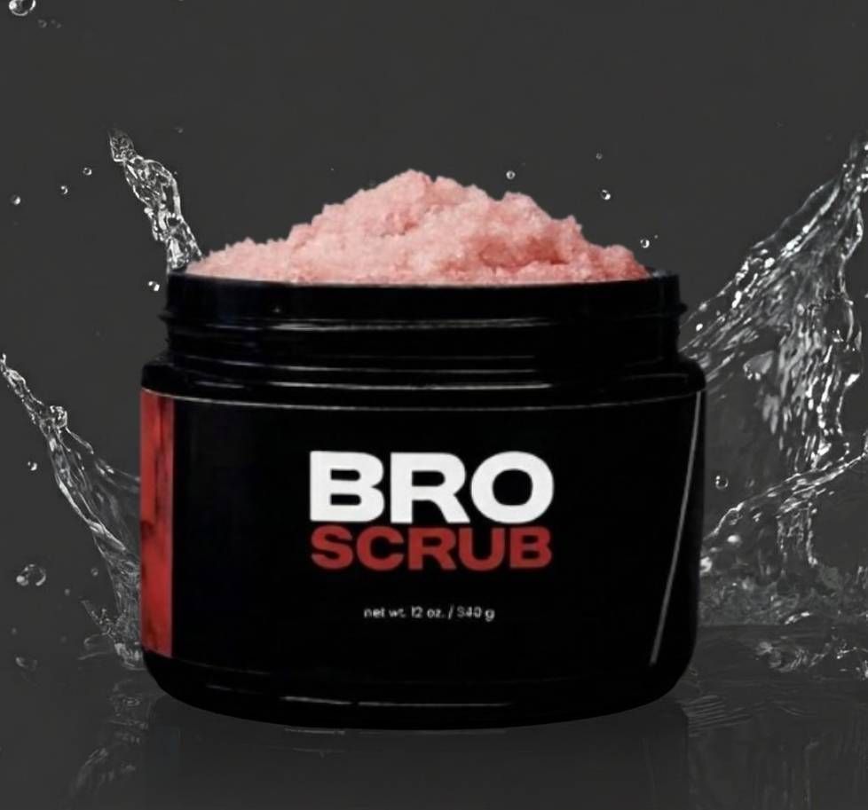 Black jar labeled “BRO SCRUB” with pink scrub, shown against a dark background.
