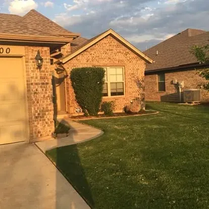 Home with fresh landscape design 