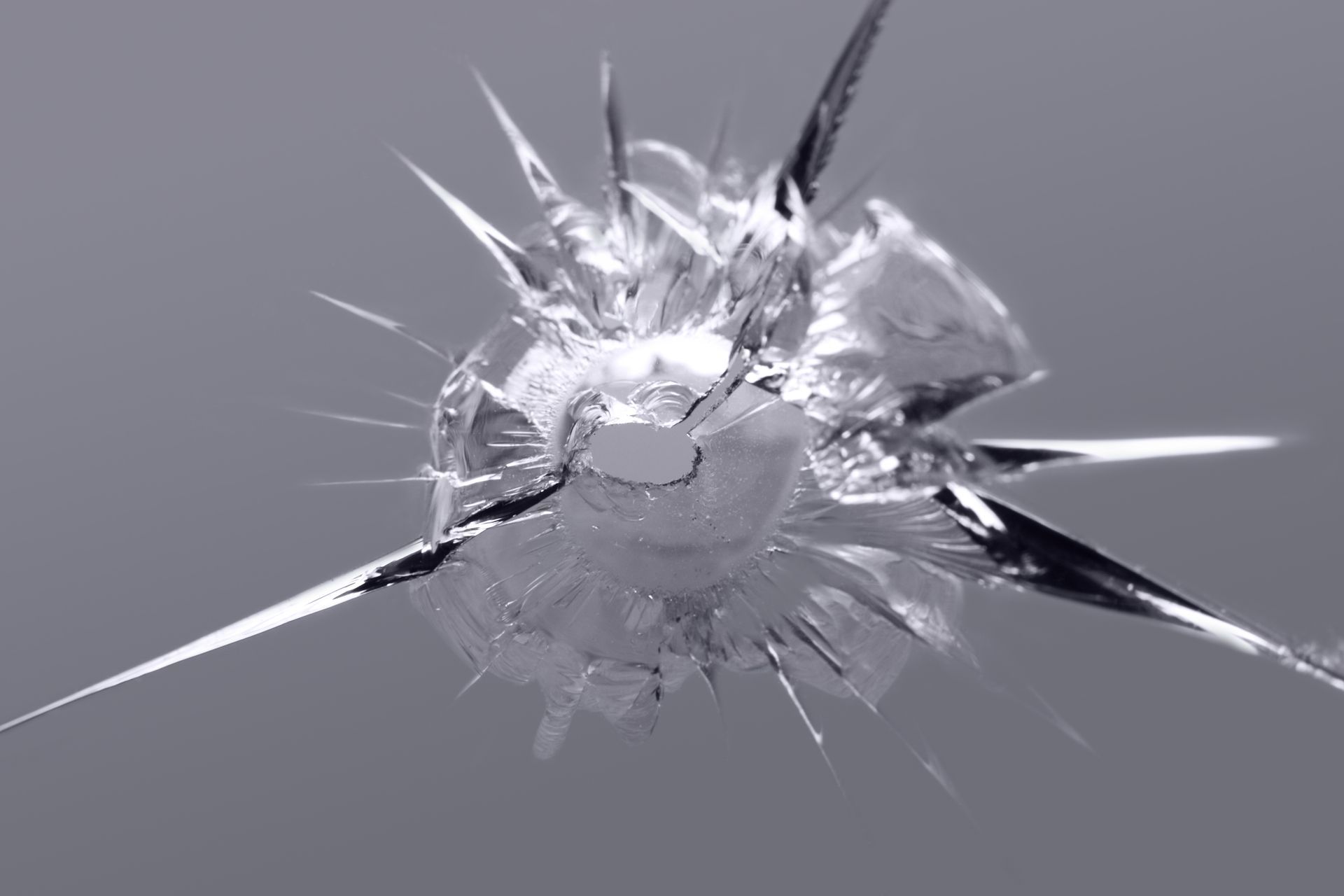 Shattered and cracked auto glass needing expert cracked windshield repair services.