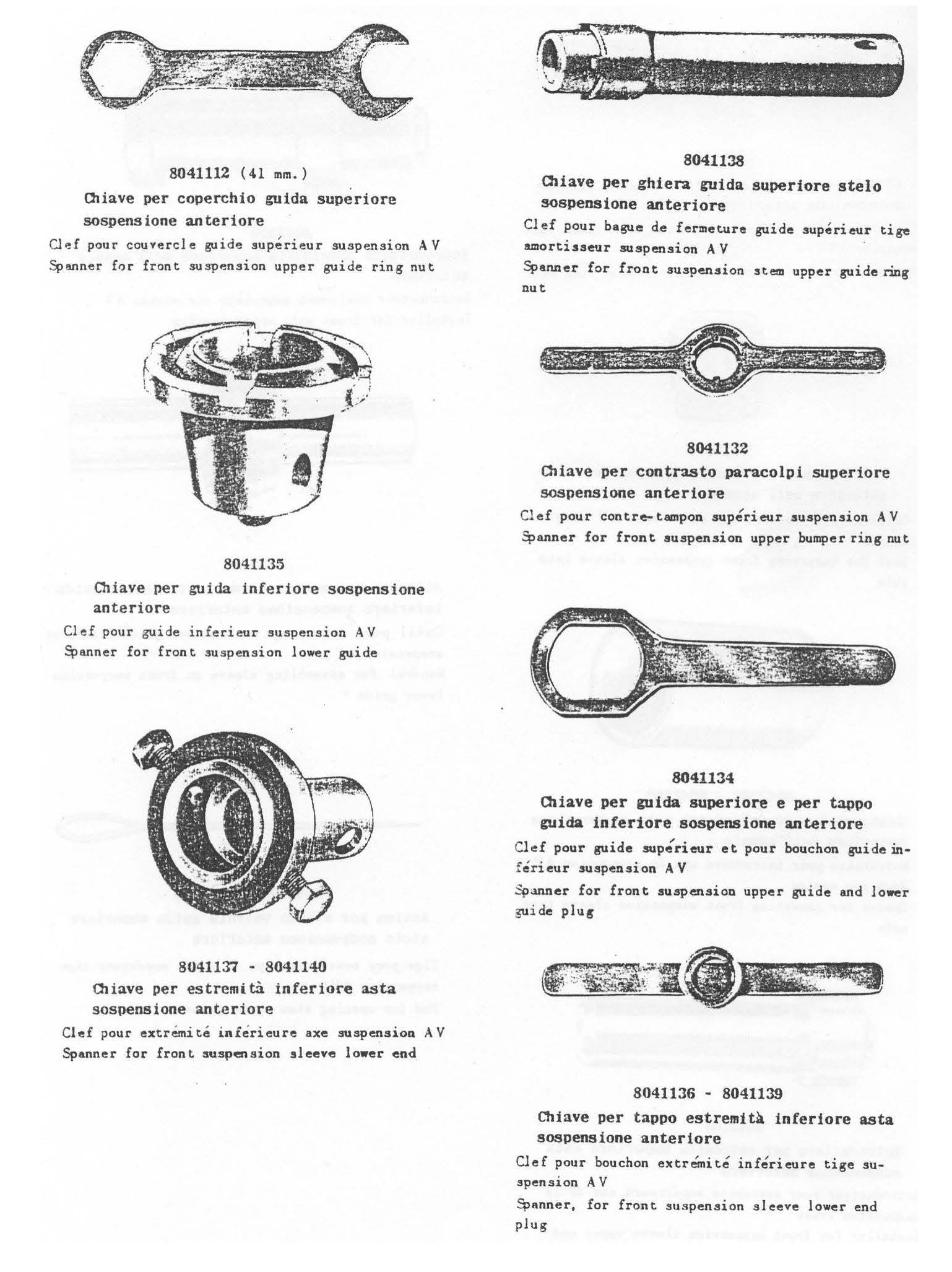 A bunch of metal parts are laying on a table