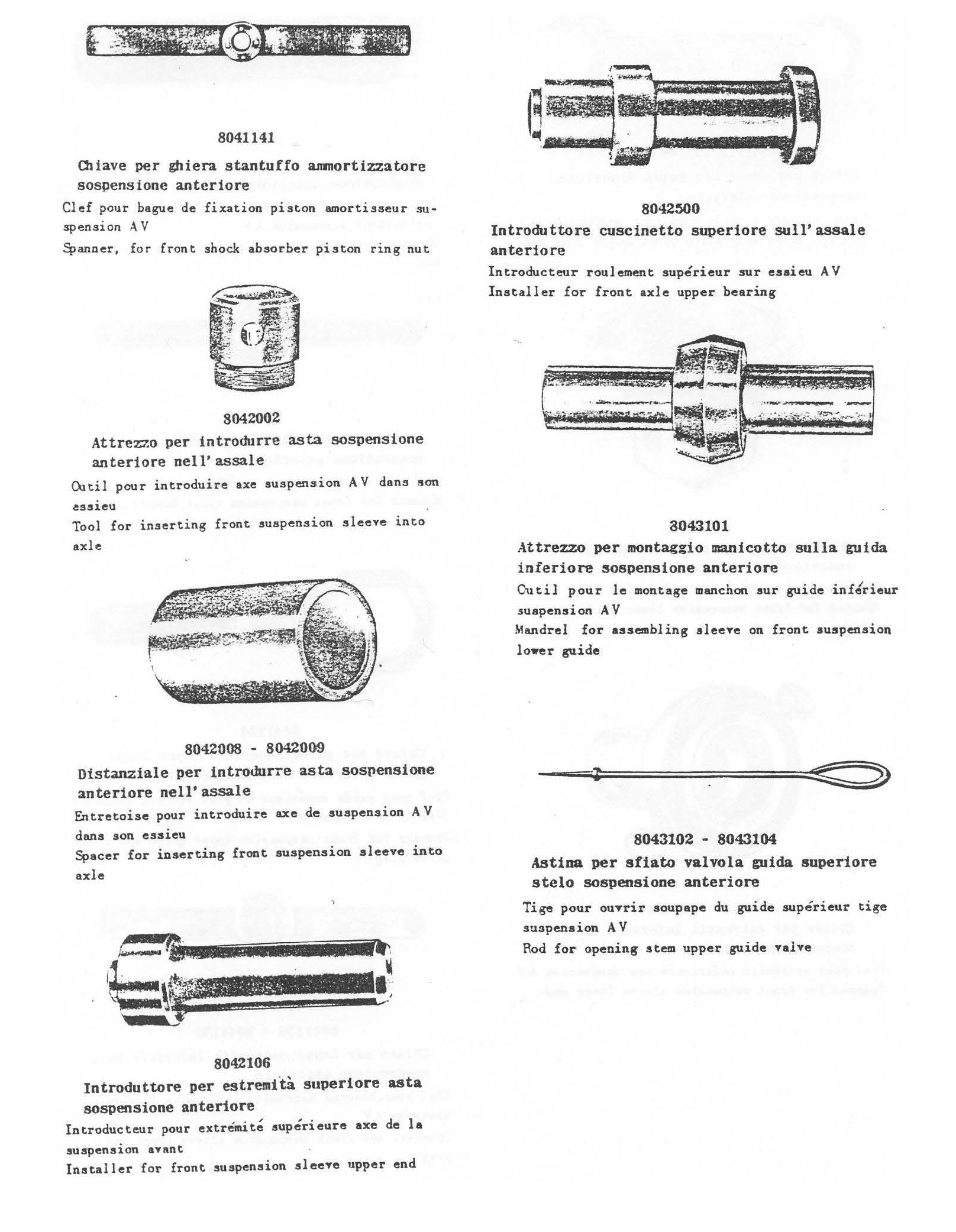 A bunch of metal parts are laying on a table