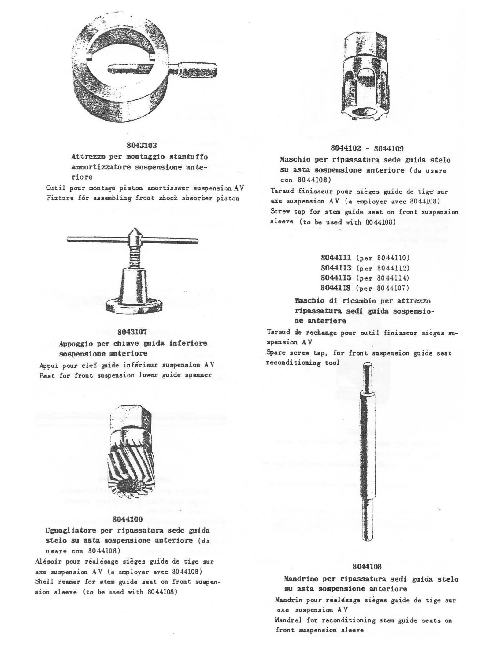 A bunch of metal parts are laying on a table