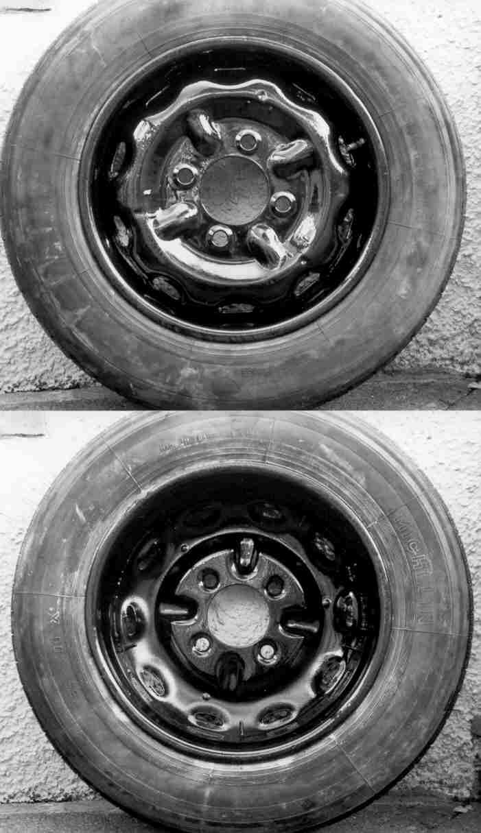 A black and white drawing of a wheel with a brake system.
