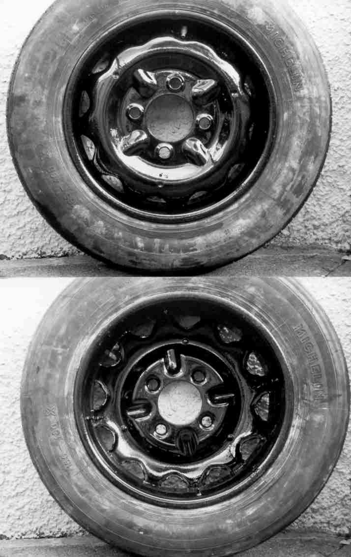 A black and white drawing of a wheel with a brake system.