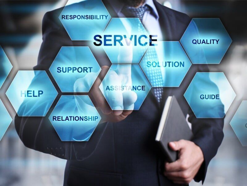 A Man In A Suit Is Pressing A Button That Says Service  — Surveillance NQ In Aitkenvale, QLD