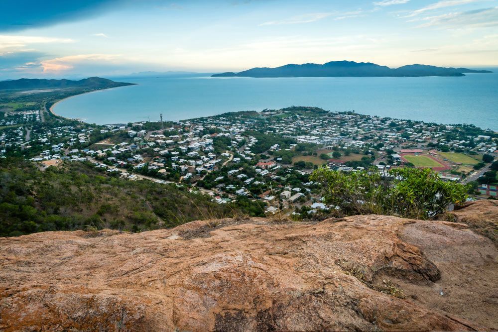 A View Of A City From A Rocky Cliff Overlooking The Ocean  — Surveillance NQ In Townsville, QLD