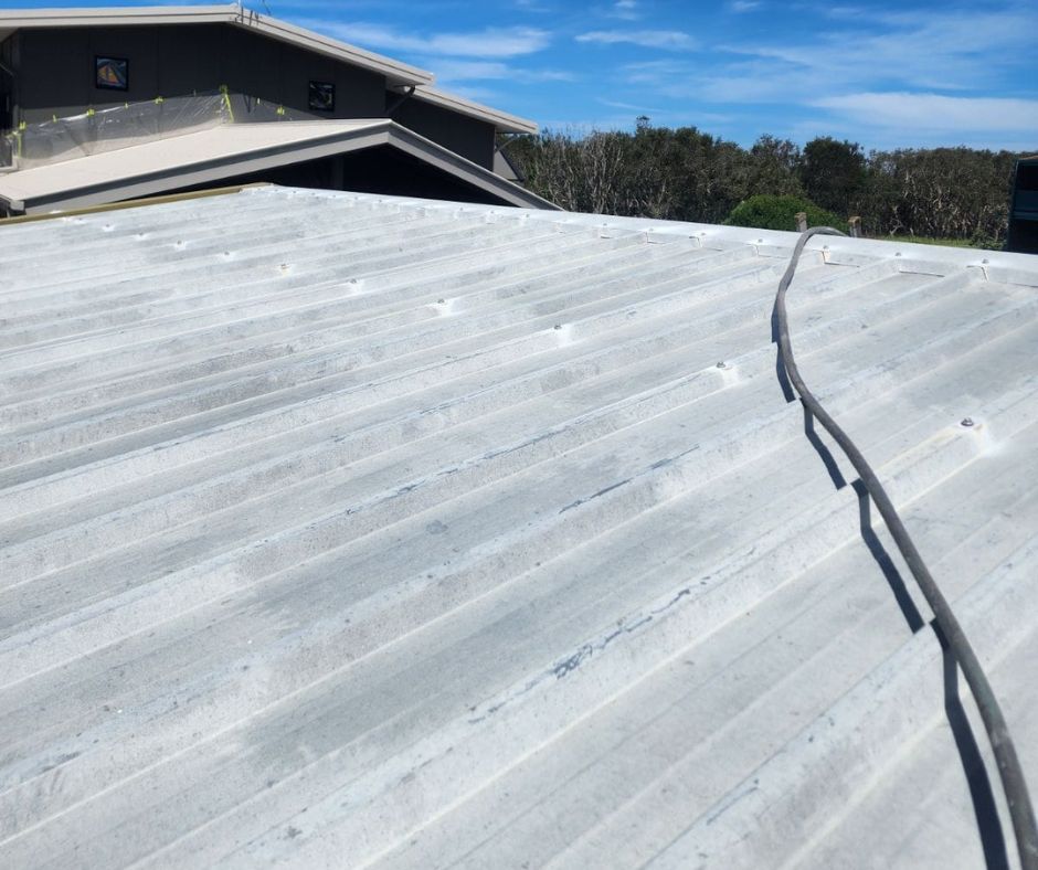 Expert roof surface preparation prior to painting