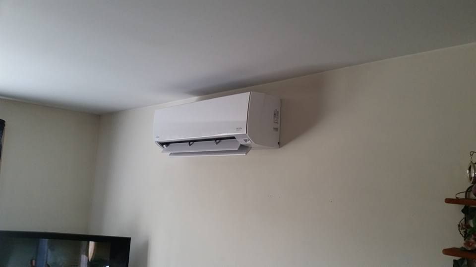 HVAC technician working on mini split