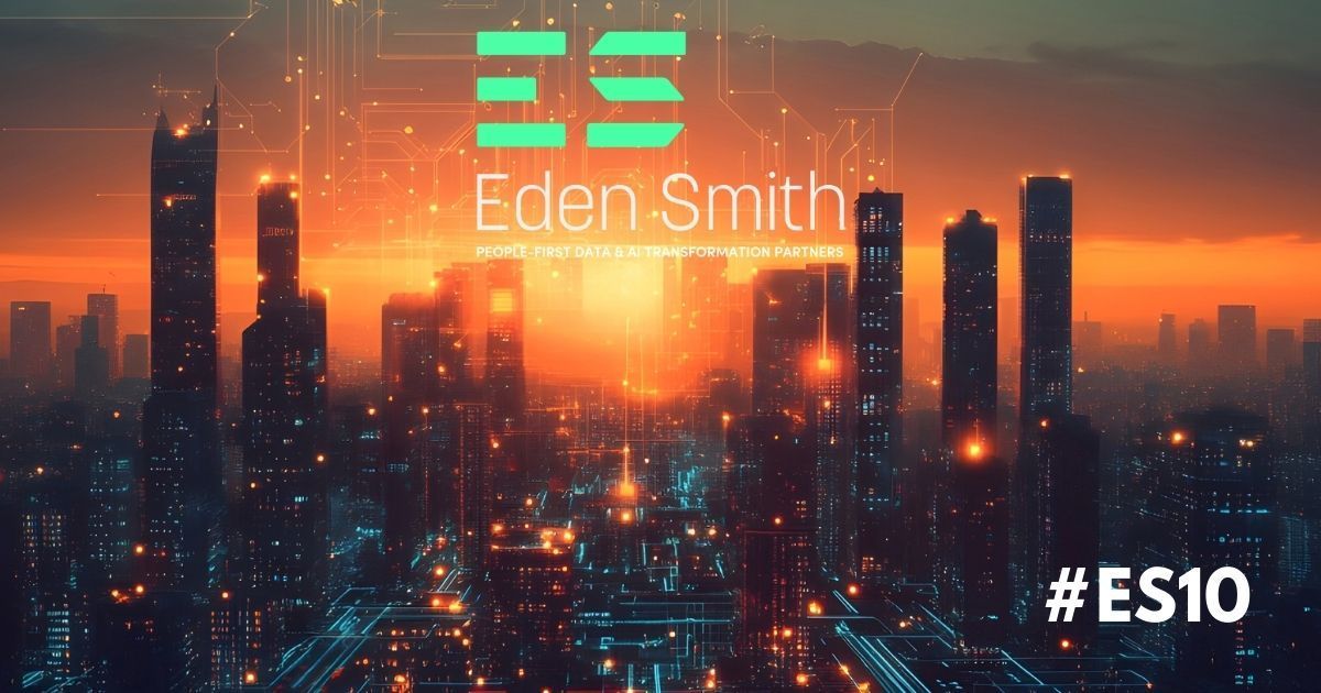 A futuristic cityscape at sunset, with the Eden Smith logo overlayed.