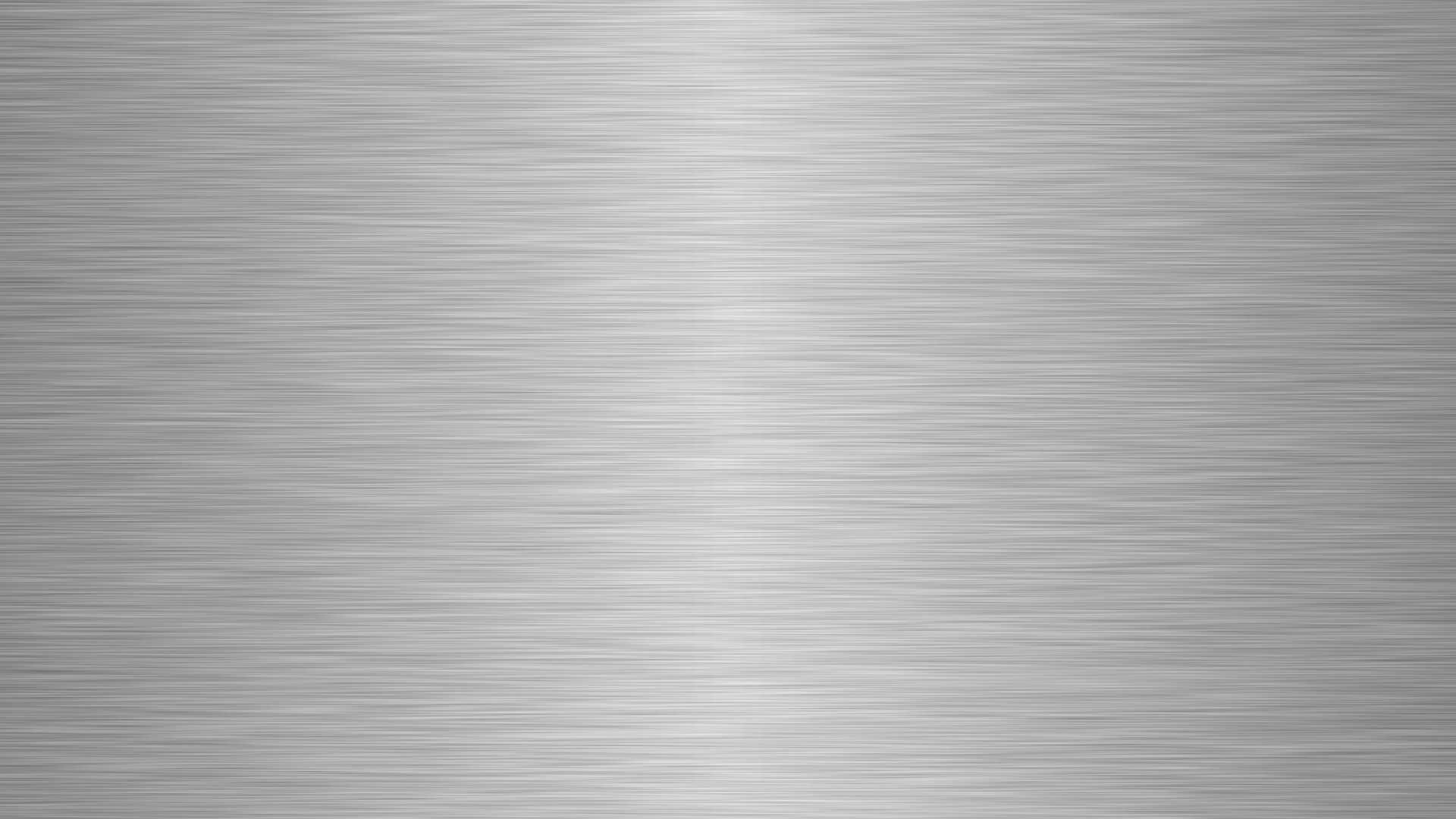 A close up of a brushed stainless steel texture.