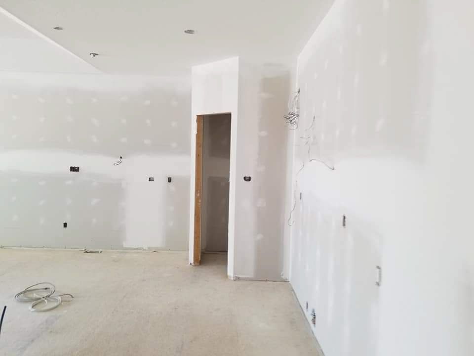 Picture of a new kitchen and pantry drywall installation