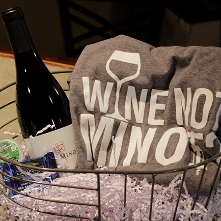 One bottle of wine with grey Wine Not Minot shirt