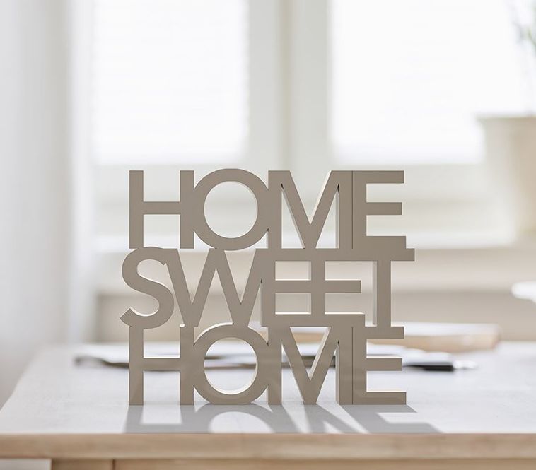 Stock photo of a home decoration that says 