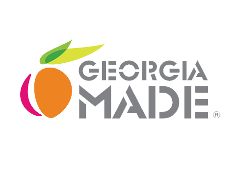 The logo for georgia made is a peach with a green leaf on it.